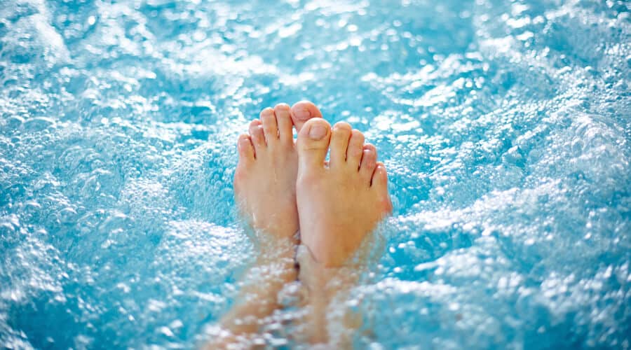 Feet in a hot tub